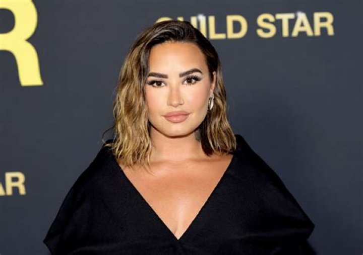 Max Ehrich Sweetly Kisses ‘Angel’ Demi Lovato In New Snaps Posted On Her 28th Birthday